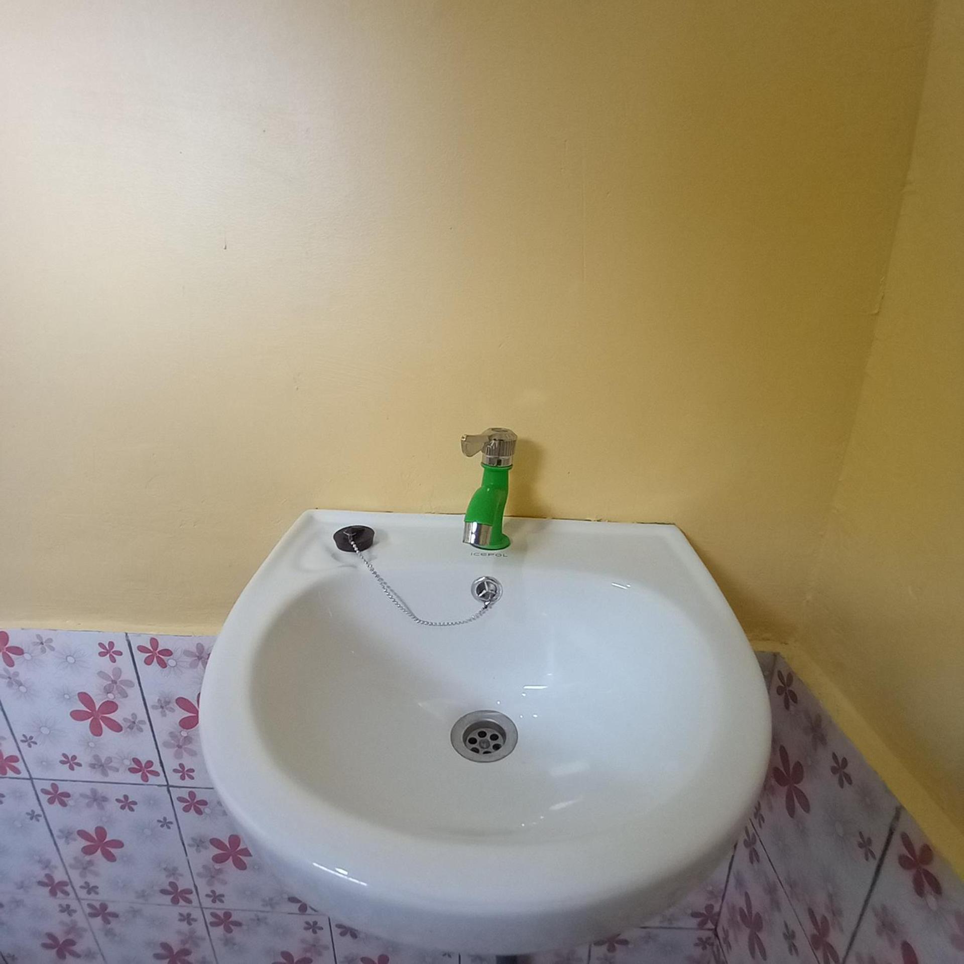 Tange Guest House Ruteng Habitación foto