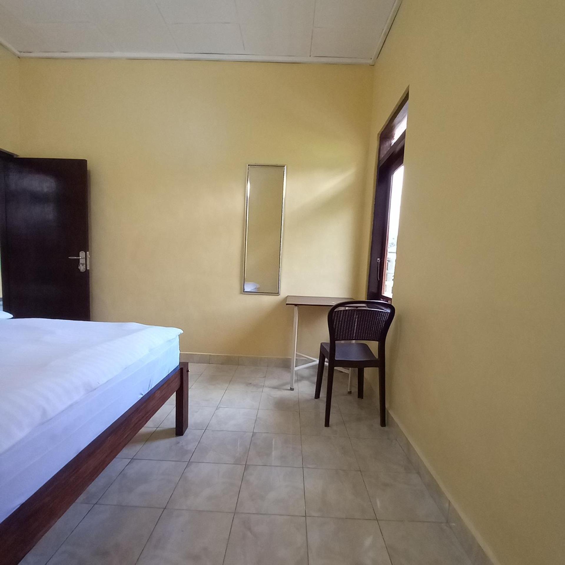 Tange Guest House Ruteng Habitación foto