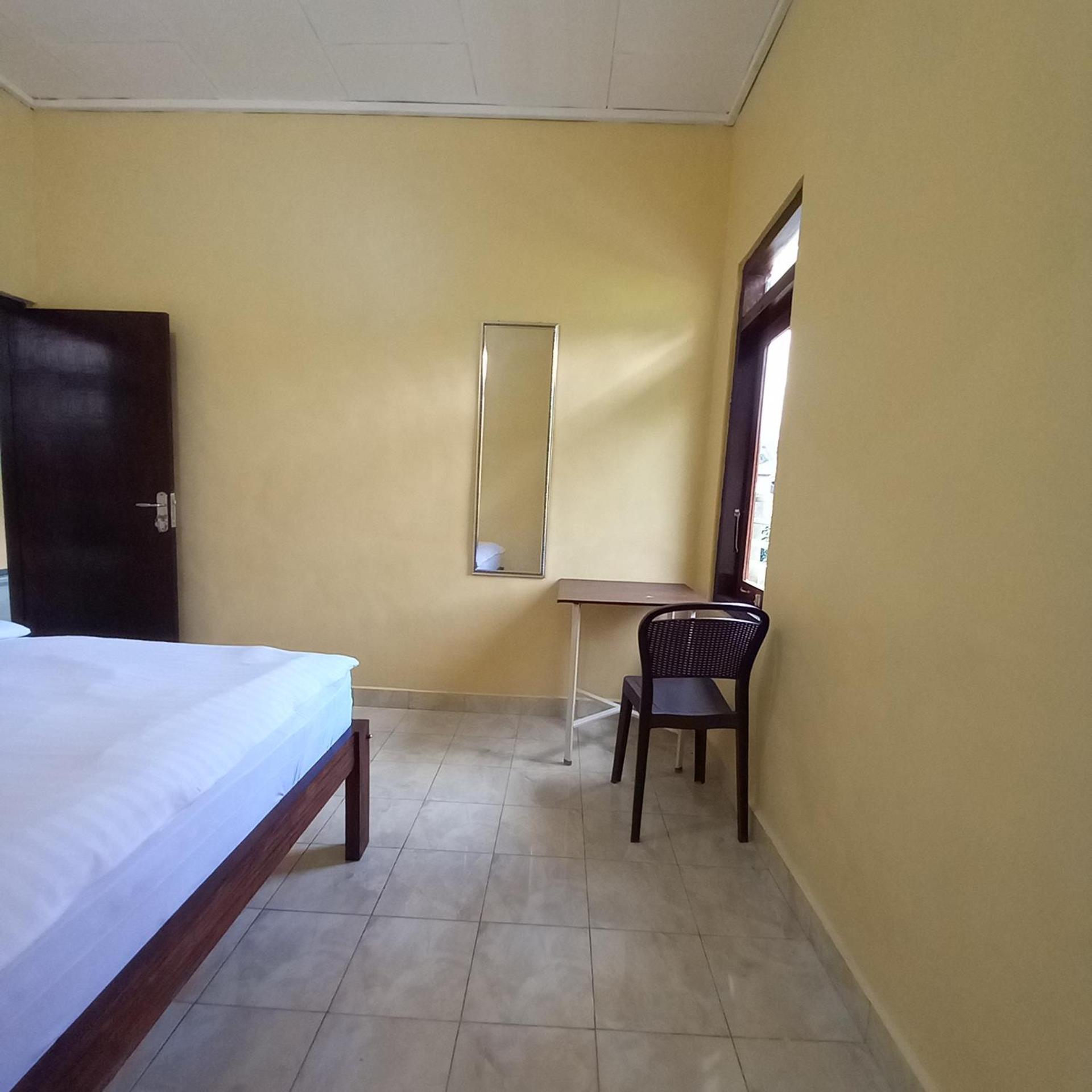 Tange Guest House Ruteng Habitación foto