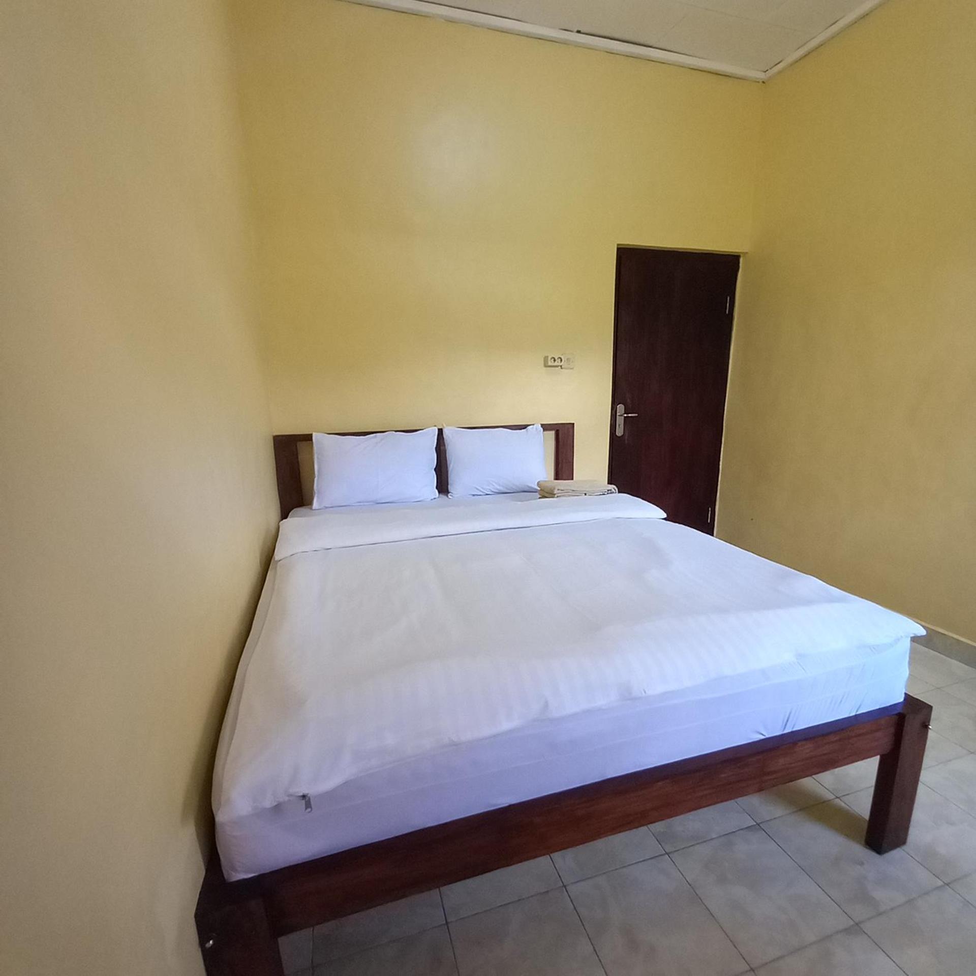 Tange Guest House Ruteng Habitación foto