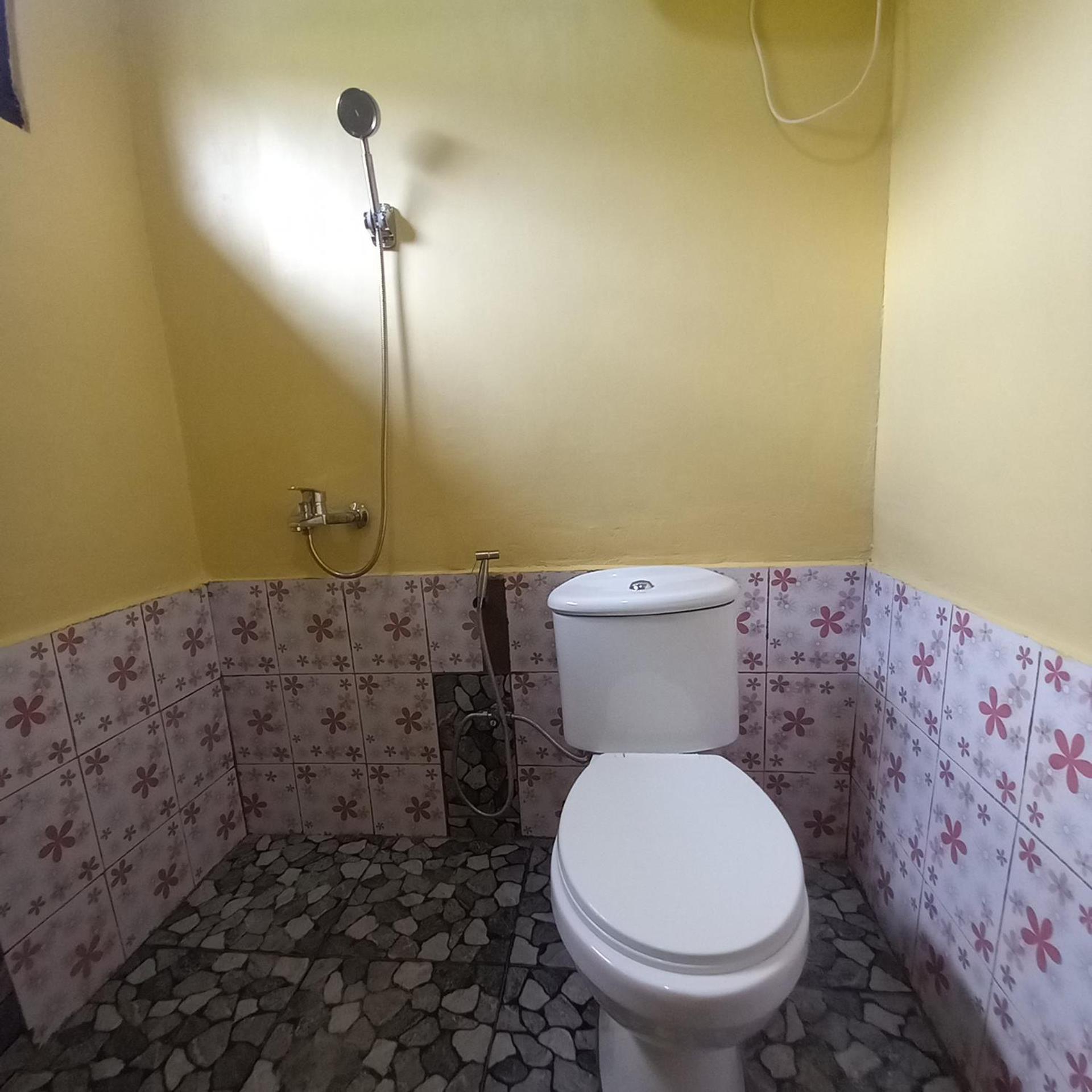 Tange Guest House Ruteng Habitación foto